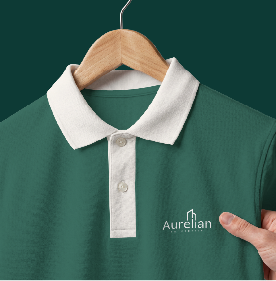 A branded polo shirt for Aurelian Properties, designed to reflect professionalism, consistency, and the refined identity of a luxury property brand.